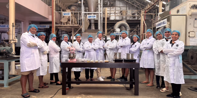 Trainees at feed mill